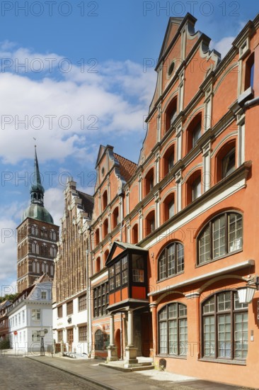 Magnificent row of houses with gables, St Nikolai Church tower at the back left, Old Town,
