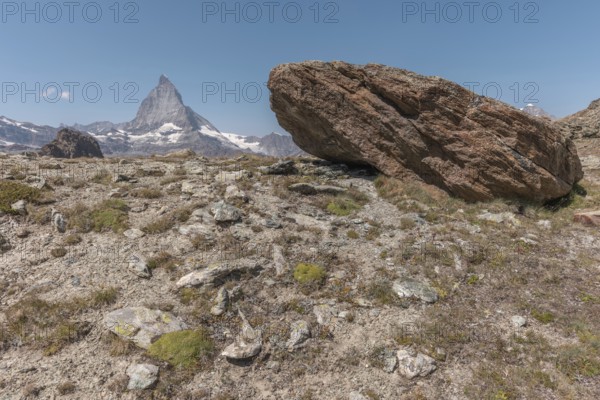 Towering Matterhorn dominates the skyline over rugged terrain and displays natural beauty. The