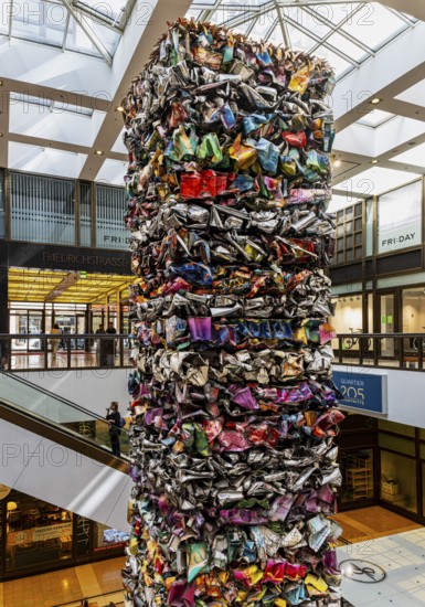 Interior design, artwork made from compressed scrap cars, partially vacant Shopping Quartier 205 in