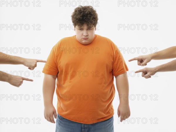 Overweight boy being judged by pointing fingers, symbolising fatshaming, bullying, judgement and