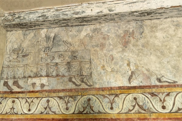 Saint Jean Chapel features ancient wall paintings showcasing religious figures with vibrant colors