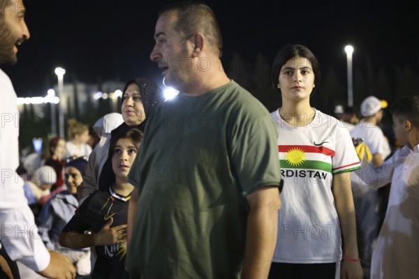 Young Kurdish woman visiting the first Damascus International Fair after Assad's fall, Damascus,