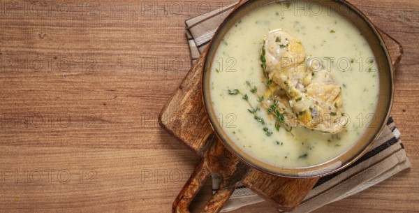 Chikhirtma chicken soup, Georgian dish, with lavash, top view, no people