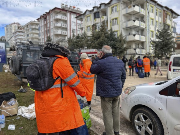 Turkish civil defense teams (AFAD) search for survivors under the rubble after a powerful 7