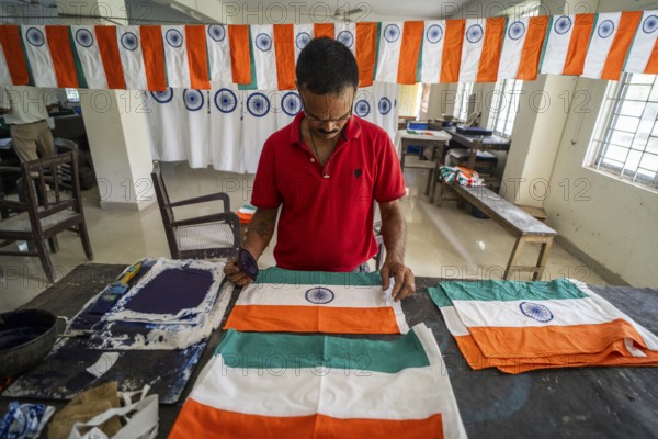 Employees of the Assam Khadi and Village Industries Board working in a manufacturing unit of Indian