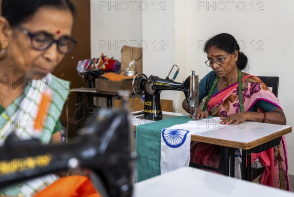 Employees of the Assam Khadi and Village Industries Board stitching in a manufacturing unit of