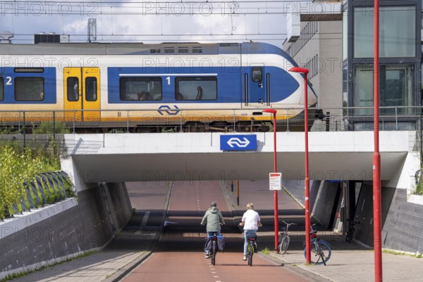 Cycle path in the east of Utrecht, subway of the railway line, at Utrecht-Lunetten station,