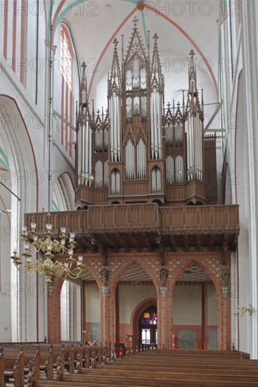 Organ in the Gothic UNESCO Cathedral of St Mary and St John, chandelier, interior view, Schwerin,