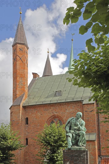 Monument to the writer and poet Emanuel Geibel by Hermann Volz 1889 and Heiligen-Geist-Hospital,