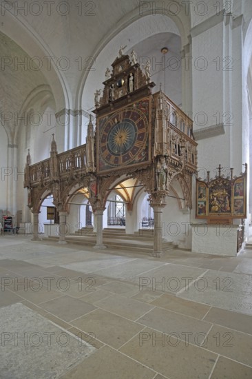 Rood screen with Gothic clock built in 1477, interior view, church clock, Lübeck Cathedral,