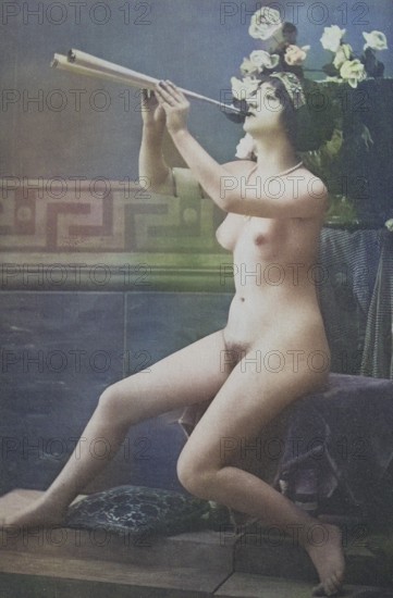 Female nude from around 1899, erotic postcard, Playgirl, Naked woman playing flute, surrounded by