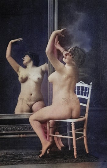 Female nude from around 1899, erotic postcard, Playgirl, A woman posing naked in front of a large