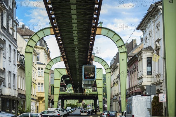 The Wuppertal suspension railway pulls into the Sonnborn stop, Wuppertal, Germany, digitally