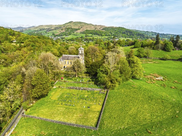 Holy Trinity Church from a drone, Bog Lane, Brathay village, Lake District, Cumbria, England,