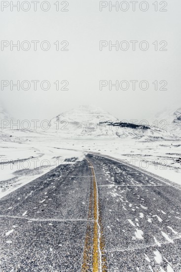 Winter road trip on the Icefields Parkway with lots of snow and ice, Banff National Park, Jasper