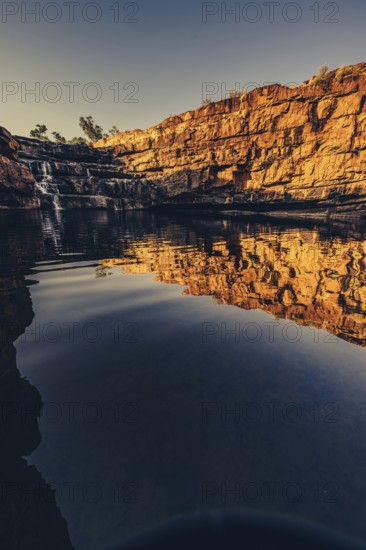 Bell Gorge waterfall, a body of water in north-west Australia in the Kimberley. Sunrise in the