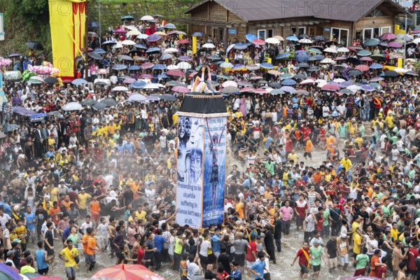 People from the Pnar community move around a Rot themed stop women harrasment as they celebrate an