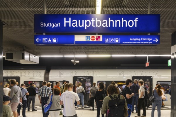 Stuttgart main station with S-Bahn. People on the platform waiting for their train. Stuttgart,