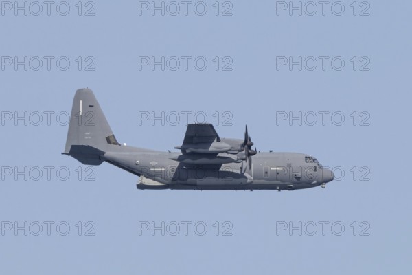 A Lockheed Martin MC-130J Commando II, a US Air Force military aircraft, flies low over Costa Rei,