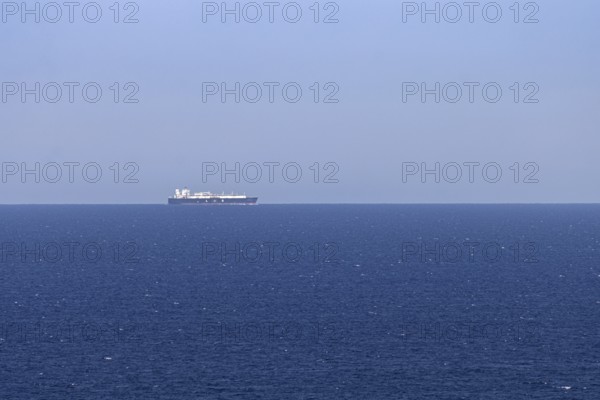 An LNG tanker sails along the Mediterranean Sea off the Costa Rei, a coastal section of the Italian