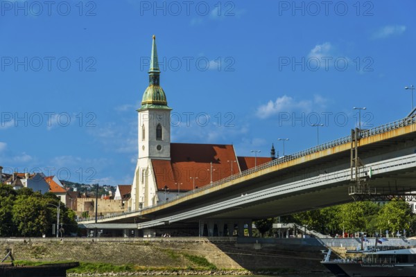 St Martin's Cathedral in Bratislava, in the foreground the Danube and the Bridge of the Slovak