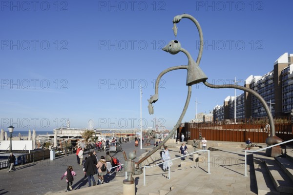 Sculpture Herring Esser by artist Tom Otterness on the seafront promenade, Scheveningen, The Hague,