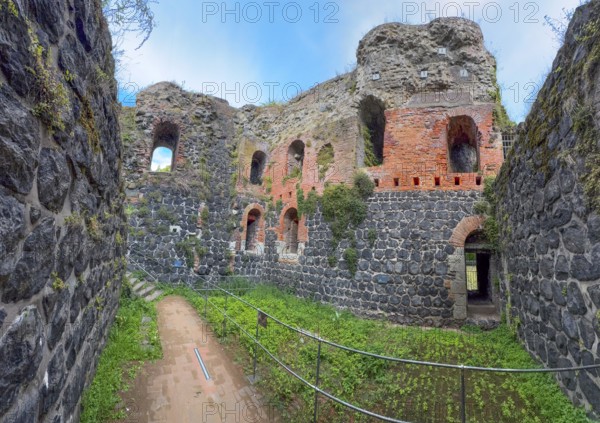 View into the interior of the northern inner part with partially restored secured masonry of the
