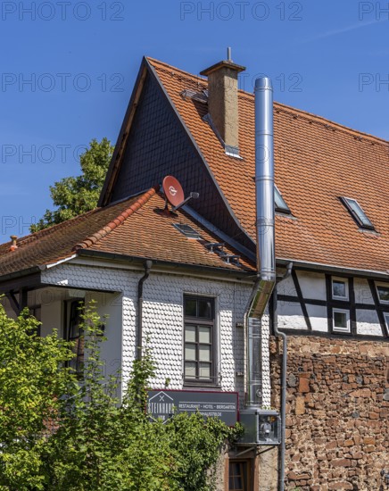 The old town centre with half-timbered houses, church towers and remains of the town wall in