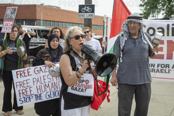 Detroit, Michigan USA - 26 July 2025 - Protesters rally at Eastern Market, banging empty pots to
