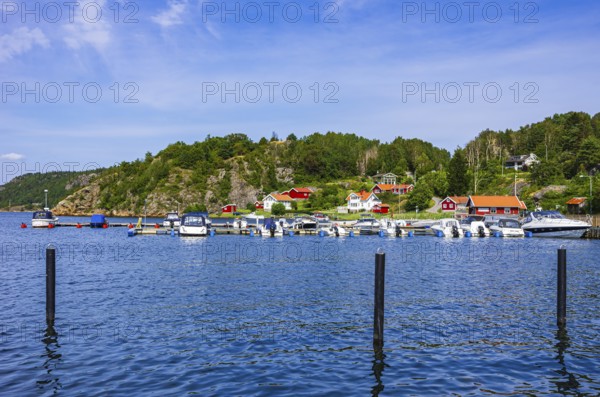 Coastal landscape with housing estate and marina in Henan, Orust, Bohuslän, Västra Götalands län,