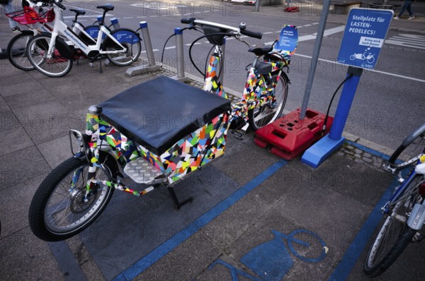 Parking space for pedelecs, cargo pedelecs, cargo bikes, e-bikes, electric bikes, hire bikes,