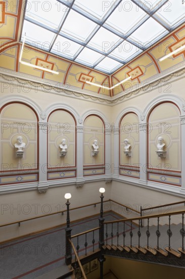 Staircase with busts of ancient Greek and Roman scholars, main building of the University of