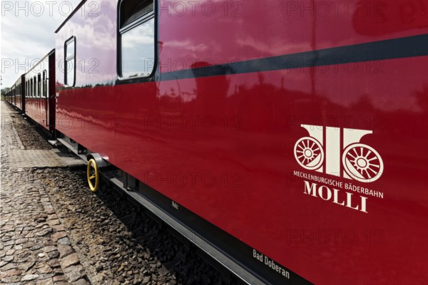 Mecklenburgische Bäderbahn Molli, logo on carriage, Baltic resort Kühlungsborn, Baltic Sea,