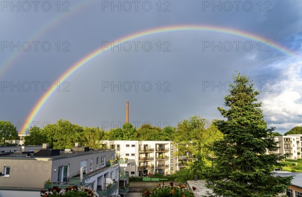 Rainbow after a thunderstorm over a residential neighbourhood in Essen-Rüttenscheid, North