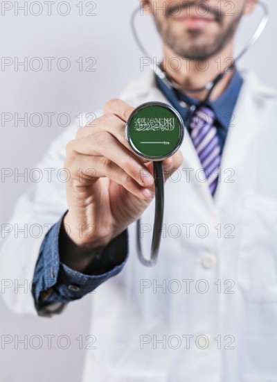 Saudi Arabia health and medical insurance concept. Saudi Arabia healthcare system, doctor holding