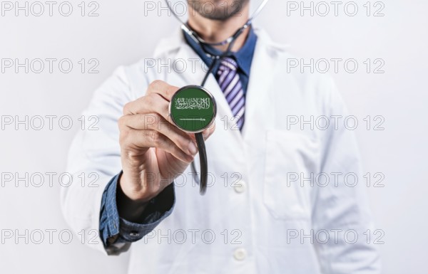 Saudi Arabia healthcare system, doctor holding stethoscope. Saudi Arabia health and medical