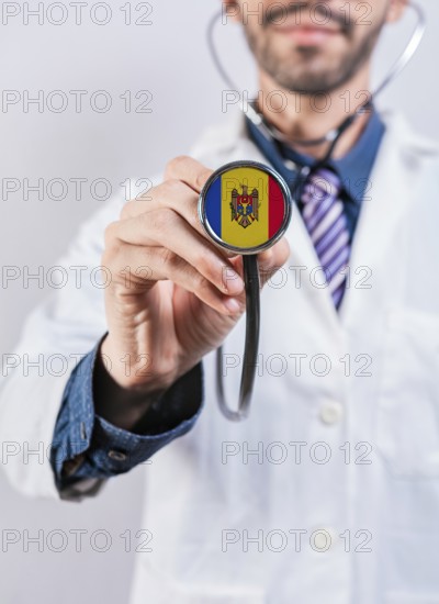 Moldova health and medical insurance concept. Moldova healthcare system, doctor holding stethoscope