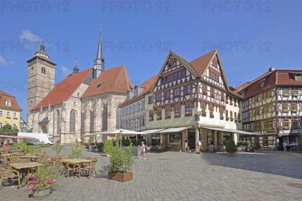 Late Gothic St George's Church and half-timbered houses with pedestrians, Altmarkt, Schmalkalden,