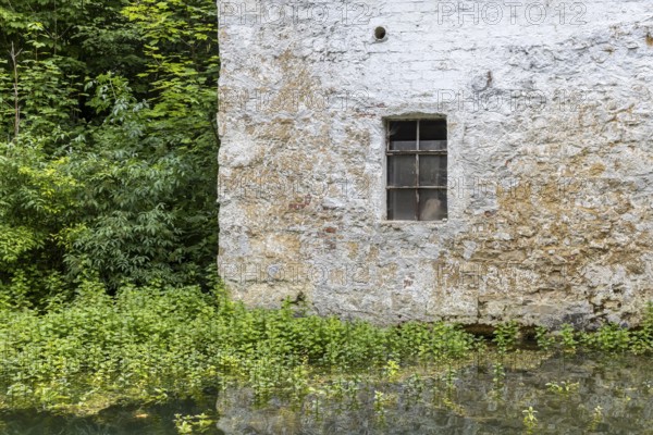 Old barn. The building is located near the source of the Zwiefalter Ach river at the Wimsen Cave