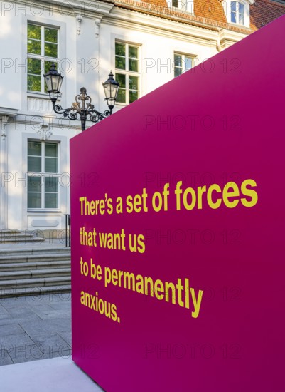 Tony Cokes, visual artist and educator, display panel at the Palais Populaire Unter den Linden,