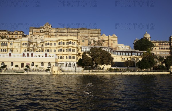 City Palace at Lake Pichola in the evening light, Udaipur, Rajasthan, India
