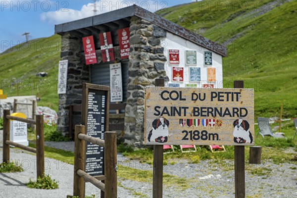Sign in French with the inscription Col du Petit Saint Bernard and altitude 2188 metres at the top