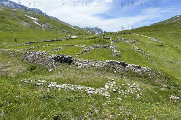 Foundation walls ruins of 2000 year old historical ancient Roman hostel Mansio at the top of the