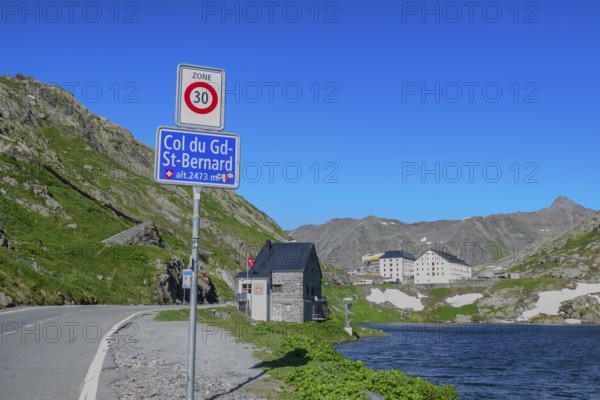Traffic sign Speed limit sign 30 km/h below information Col du Gd-St.Bernard Grand Saint Bernard
