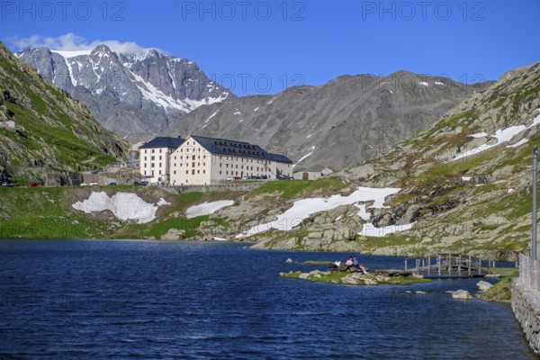 View from Italian side on small island in Lac du Grand Saint Bernard in the background on Swiss