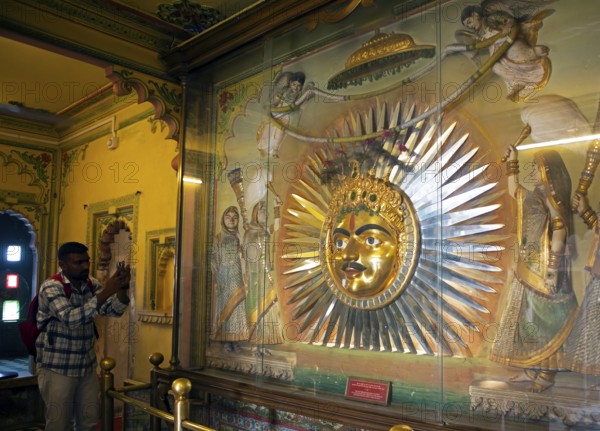 Mewad kingdom mask, sun god symbol in the City Palace Museum, City Palace of Udaipur, Rajasthan,
