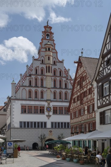 Historic town hall, built in 1426, historic half-timbered houses on the right, Bad forest lake,