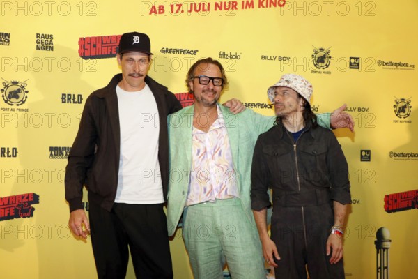 Marxc Hosemann, director Oliver Rihs with songwriter of Schwarze Schafe Tobias Jundt (Bonaparte) at