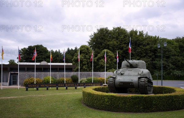 Sherman tank of the US Army is on display in front of the museum, Musée memorial 1944 de la