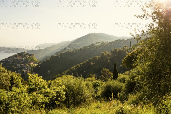 Picturesque mountain village above the sea, sunset, Èze, Cote d'Azur, Alpes-Maritimes,